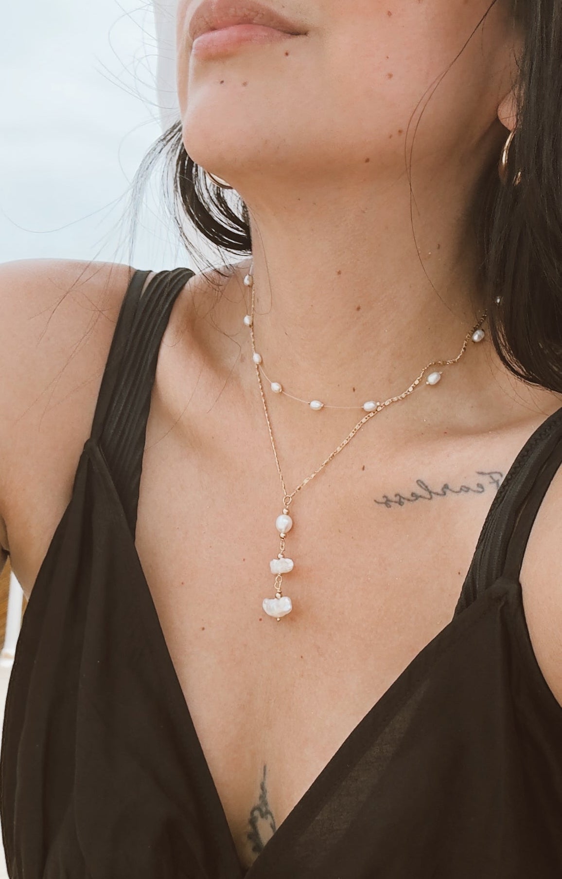 Peace pearl necklace