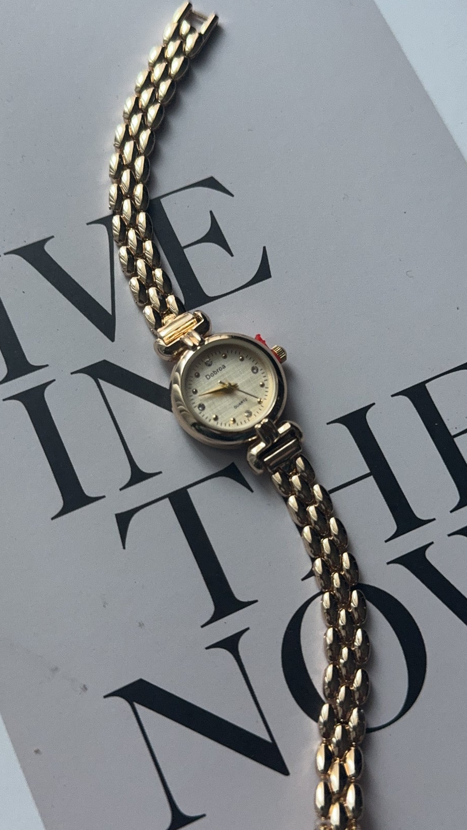 Gold round vintage watch