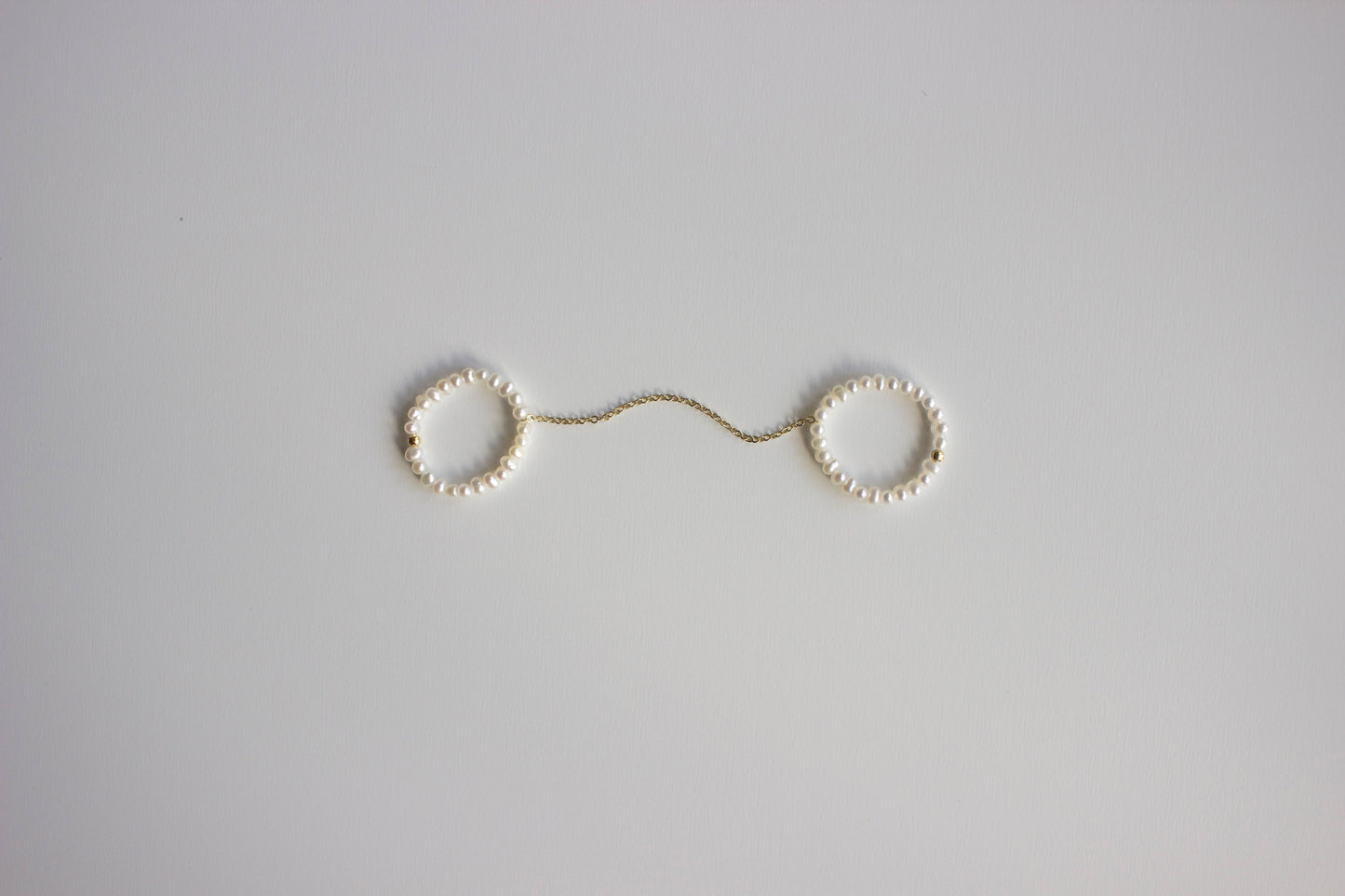 Double pearl ring with chain